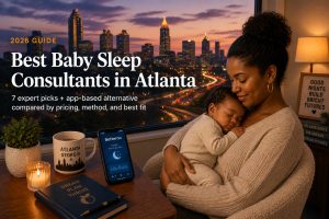 Tired Atlanta parent holding sleeping baby in a softly lit nursery with the Atlanta skyline at dusk, illustrating the best baby sleep consultants in Atlanta guide
