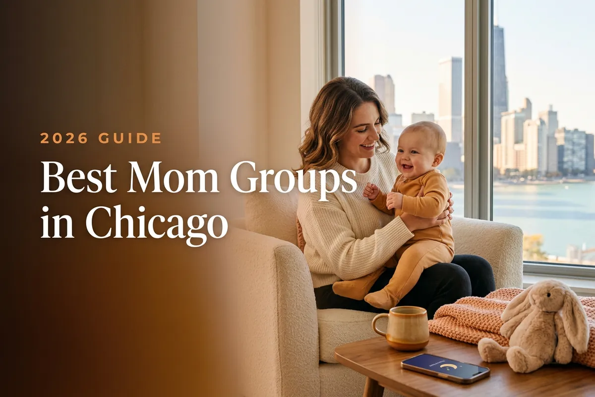 A mom holding her baby at a welcoming Chicago mom group meetup with the city skyline and lakefront behind them, for a guide to the best mom groups in Chicago for 2026