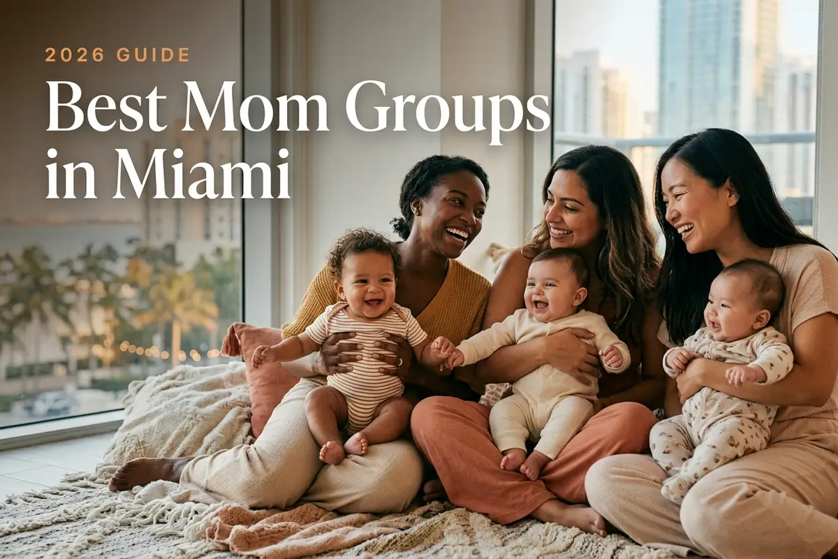 Three diverse moms holding their babies at a welcoming mom group meetup in Miami, with the Miami skyline and palm trees glowing under bright coastal daylight behind them, illustrating a guide to the best mom groups in Miami for 2026