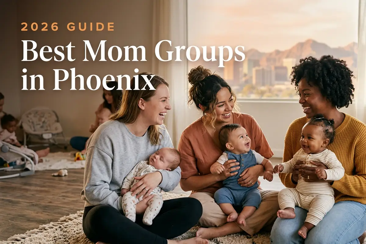 Three diverse moms holding their babies at a welcoming mom group meetup in Phoenix, with the Phoenix skyline with desert mountains in warm golden light behind them, illustrating a guide to the best mom groups in Phoenix for 2026