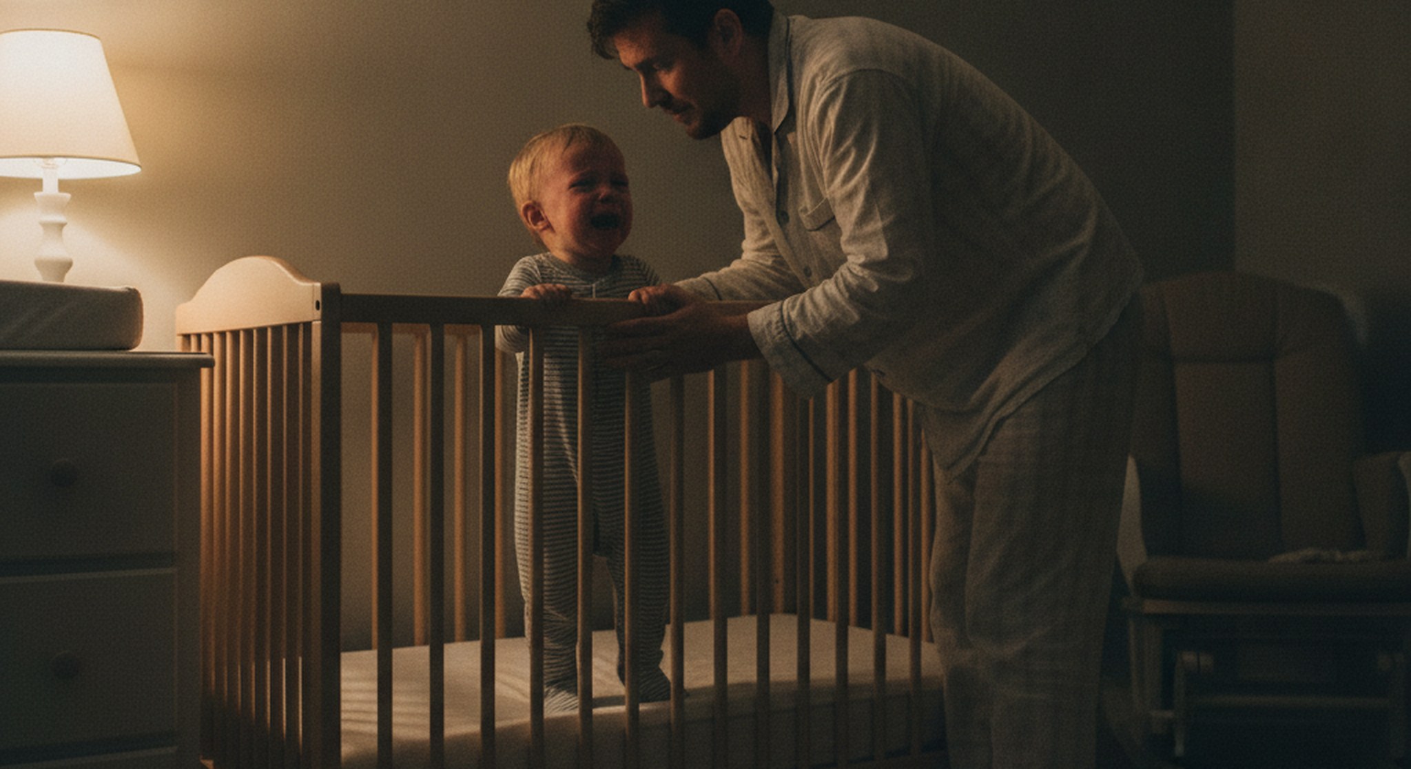 14 month sleep regression, tired parent soothing an awake baby at night