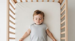 19 month old sleep schedule, baby sleeping safely on their back in a bare crib