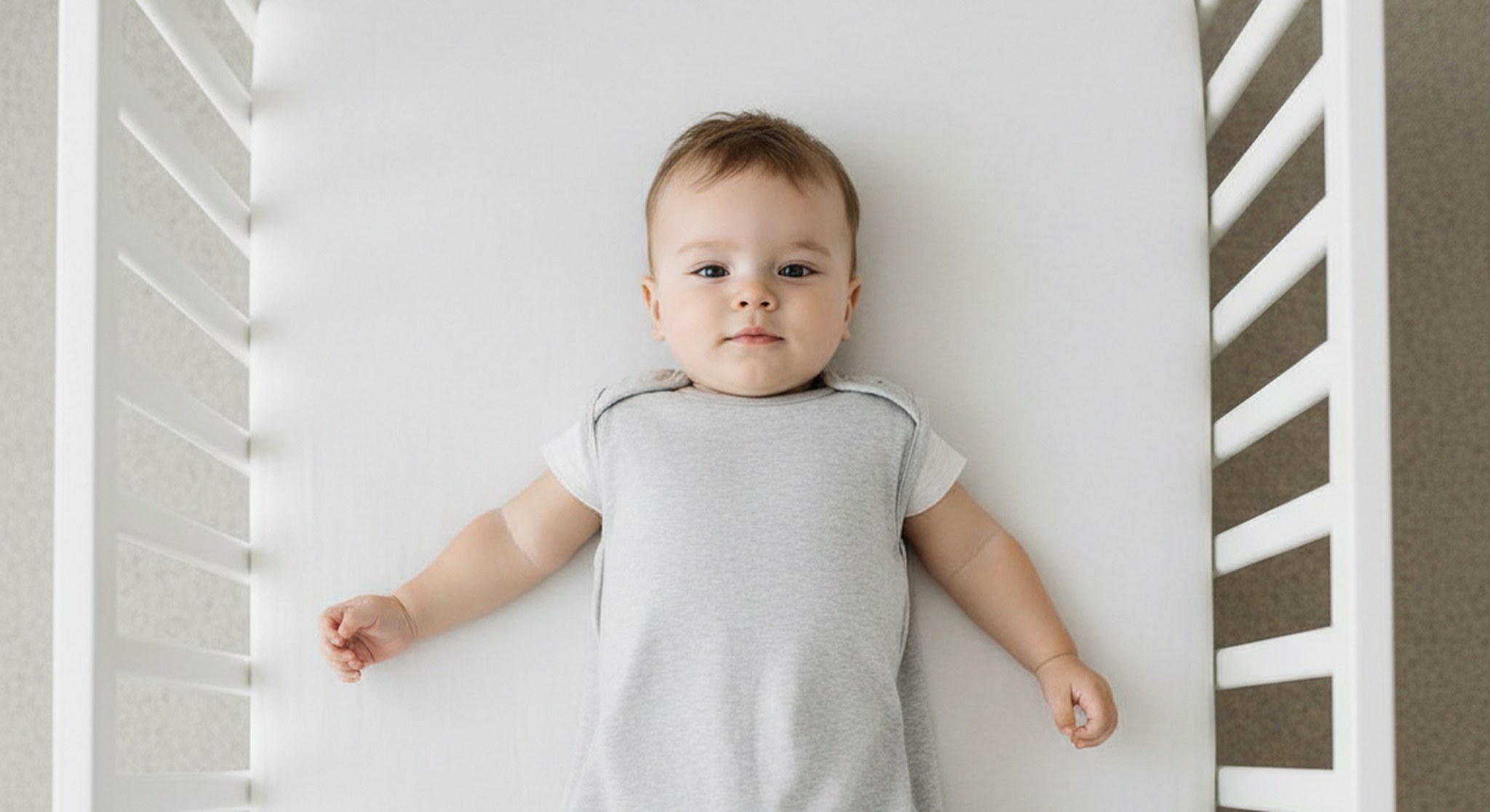 21 month old sleep schedule, baby sleeping safely on their back in a bare crib