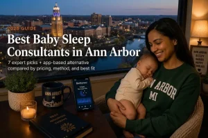 Ann Arbor parent holding a sleeping baby by a window at dusk, our guide to baby sleep consultants in Ann Arbor.