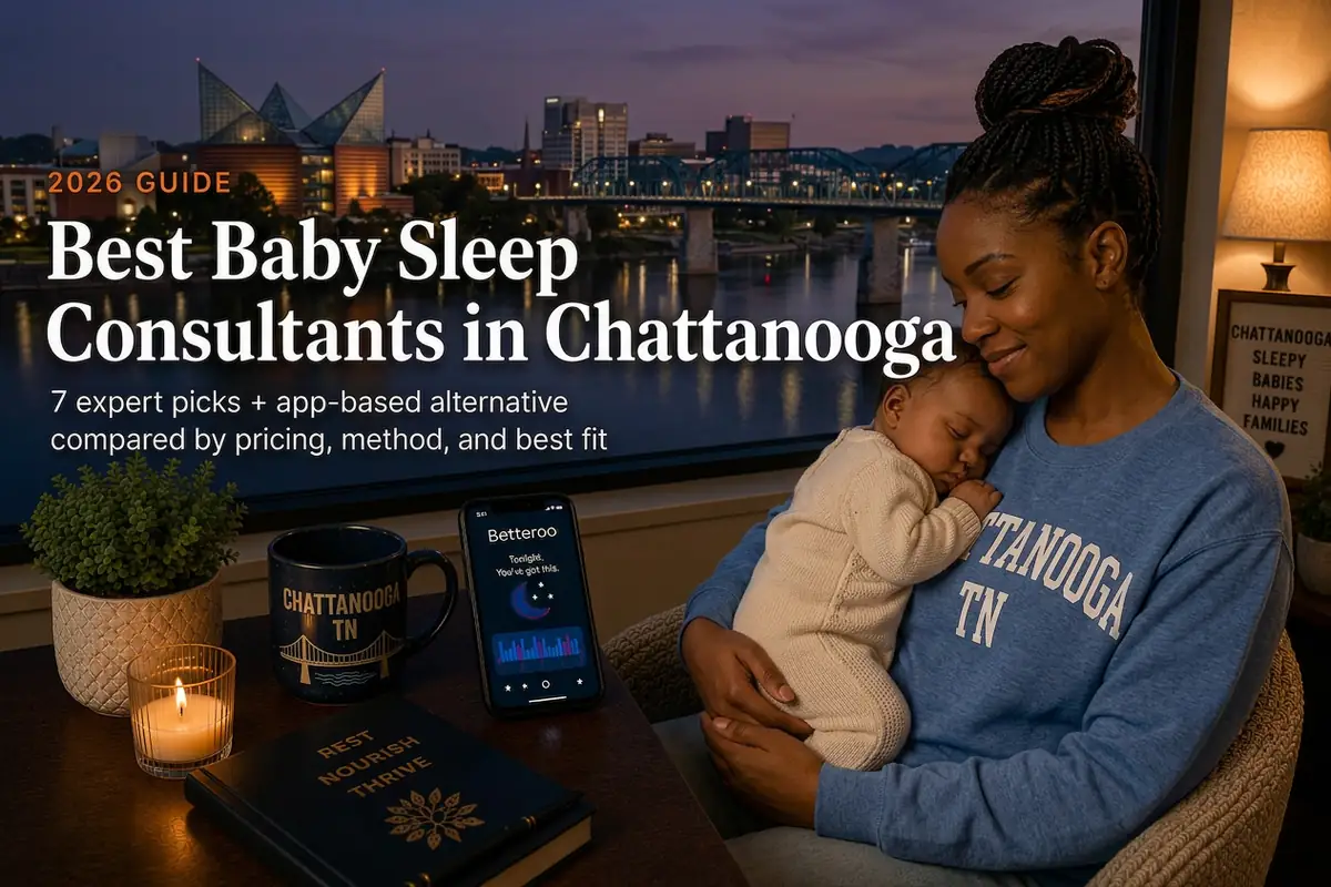 Mother holding a sleeping baby by a window at dusk, guide to the best baby sleep consultants in Chattanooga, Tennessee