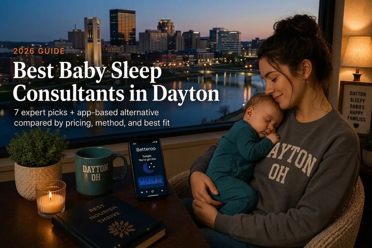 A mother cradling her sleeping baby by a window over the Dayton skyline at dusk, best baby sleep consultants in Dayton