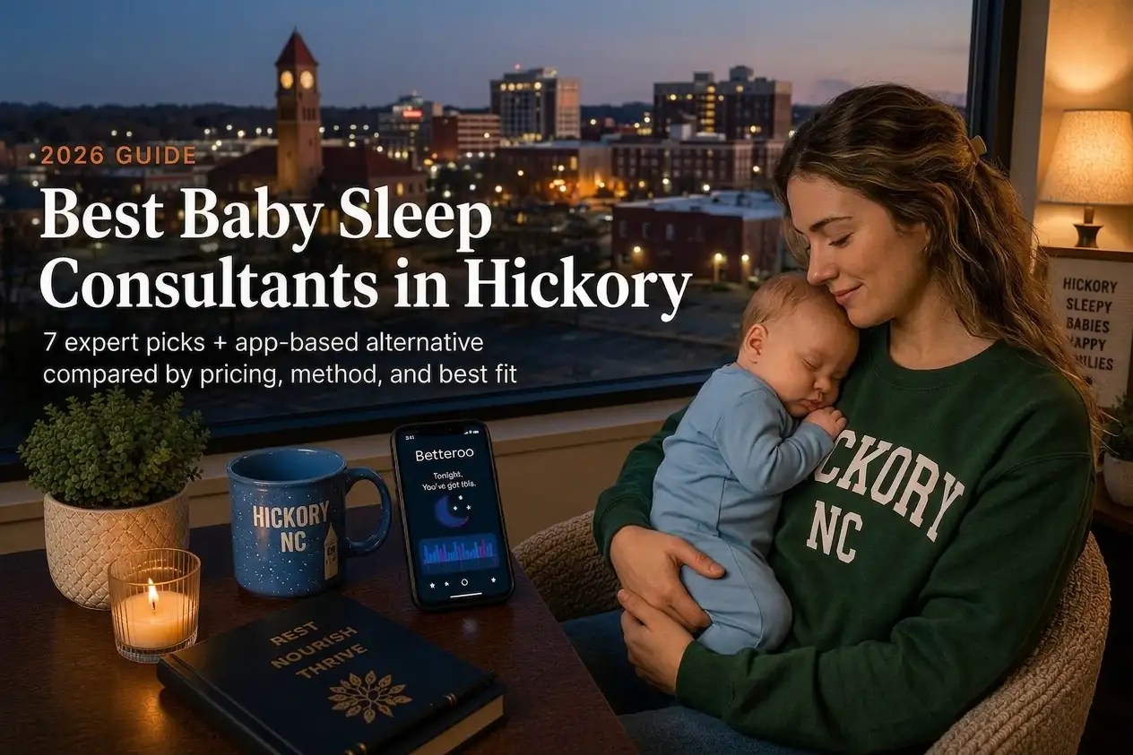 Hickory parent holding a sleeping baby by a window at dusk, our guide to baby sleep consultants in Hickory.