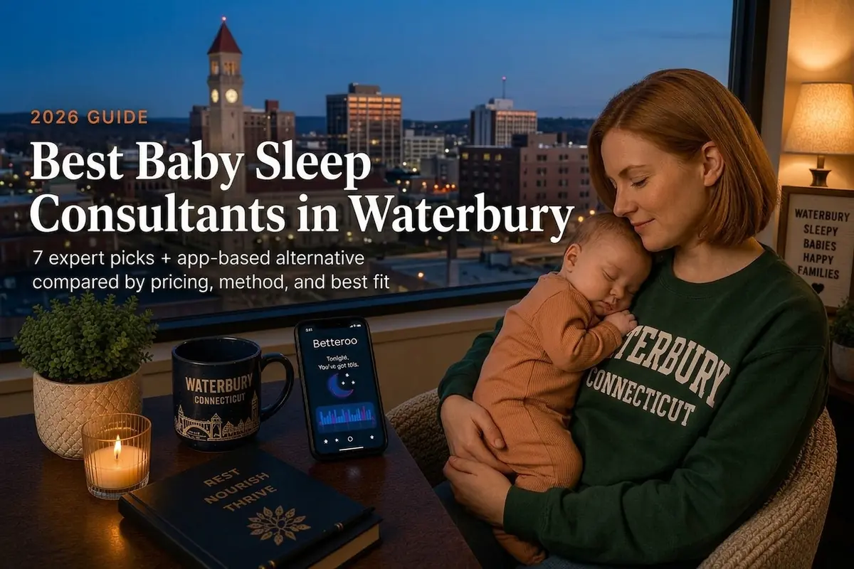 Tired Waterbury Connecticut mother holding her sleeping baby by a window at dusk, researching the best baby sleep consultants in Waterbury