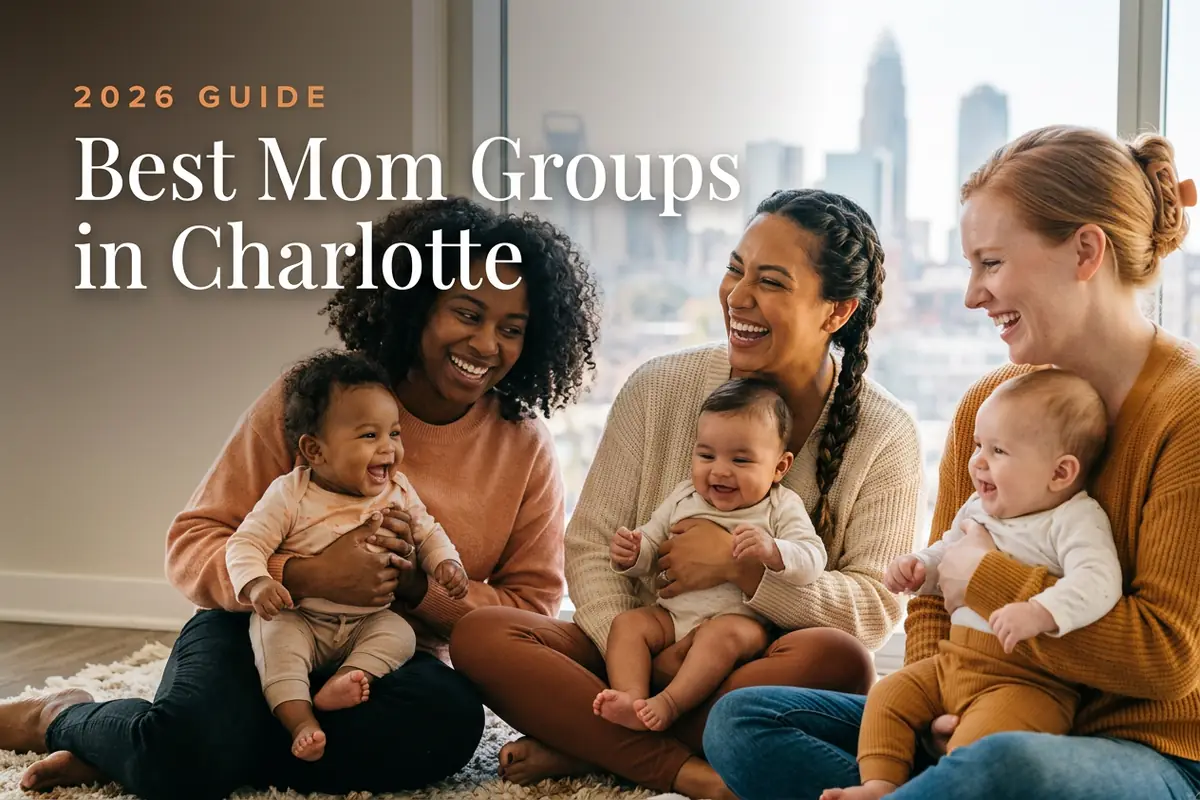 Three diverse moms holding their babies at a welcoming mom group meetup in Charlotte, with the Charlotte Uptown skyline in warm daylight behind them, illustrating a guide to the best mom groups in Charlotte for 2026