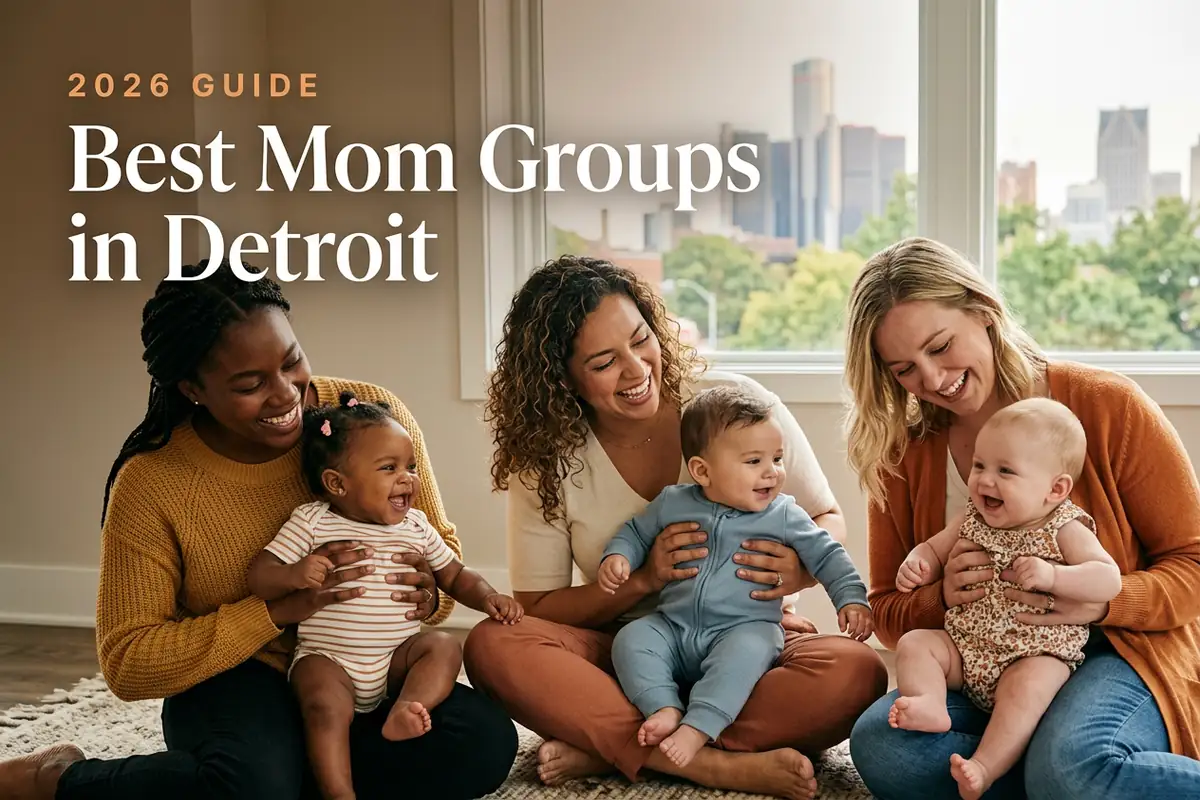 Three diverse moms holding their babies at a welcoming mom group meetup in Detroit, with the Detroit skyline in warm daylight behind them, illustrating a guide to the best mom groups in Detroit for 2026