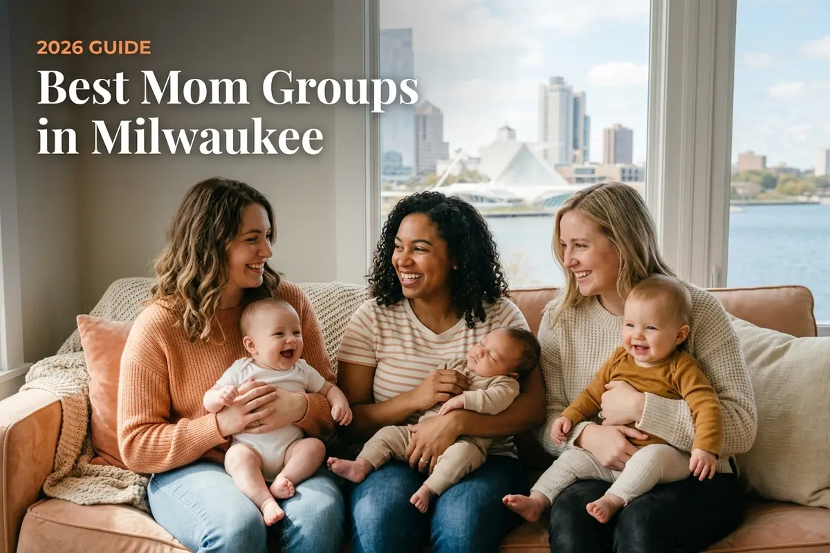 Best mom groups in Milwaukee, WI: three moms holding their babies together at a local mom group meetup in 2026