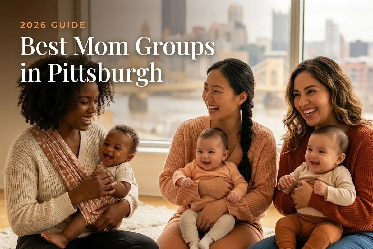 Four smiling mothers hold babies in a bright room, illustrating a 2026 guide to the best mom groups in Pittsburgh.