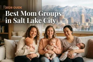 Best mom groups in Salt Lake City, UT: three moms holding their babies together at a local mom group meetup in 2026