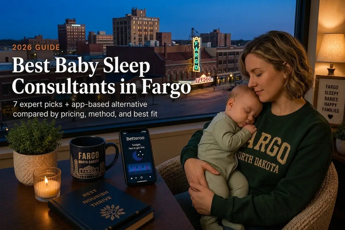 A tired mother holding a sleeping baby by a window at dusk in Fargo, illustrating a 2026 guide to the best baby sleep consultants in Fargo