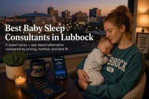 A mother holds her sleeping baby by a window overlooking the Lubbock Texas skyline at dusk, illustrating baby sleep consultants in Lubbock, Texas.