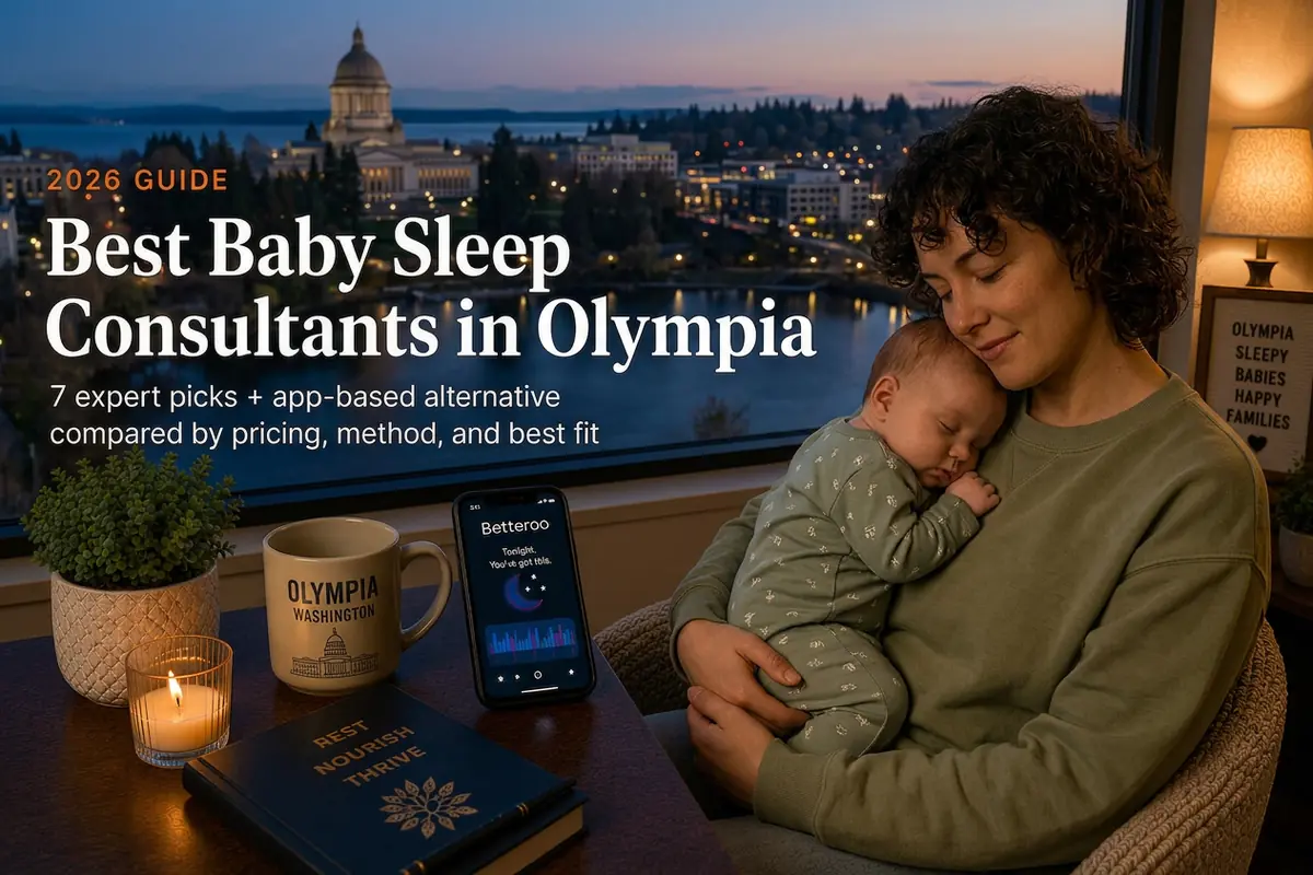 A tired mother holding a sleeping baby by a window at dusk in Olympia, illustrating a 2026 guide to the best baby sleep consultants in Olympia