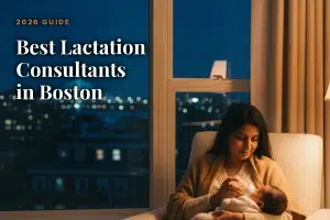 Mother feeding her baby at home in the evening, illustrating a guide to the best lactation consultants in Boston