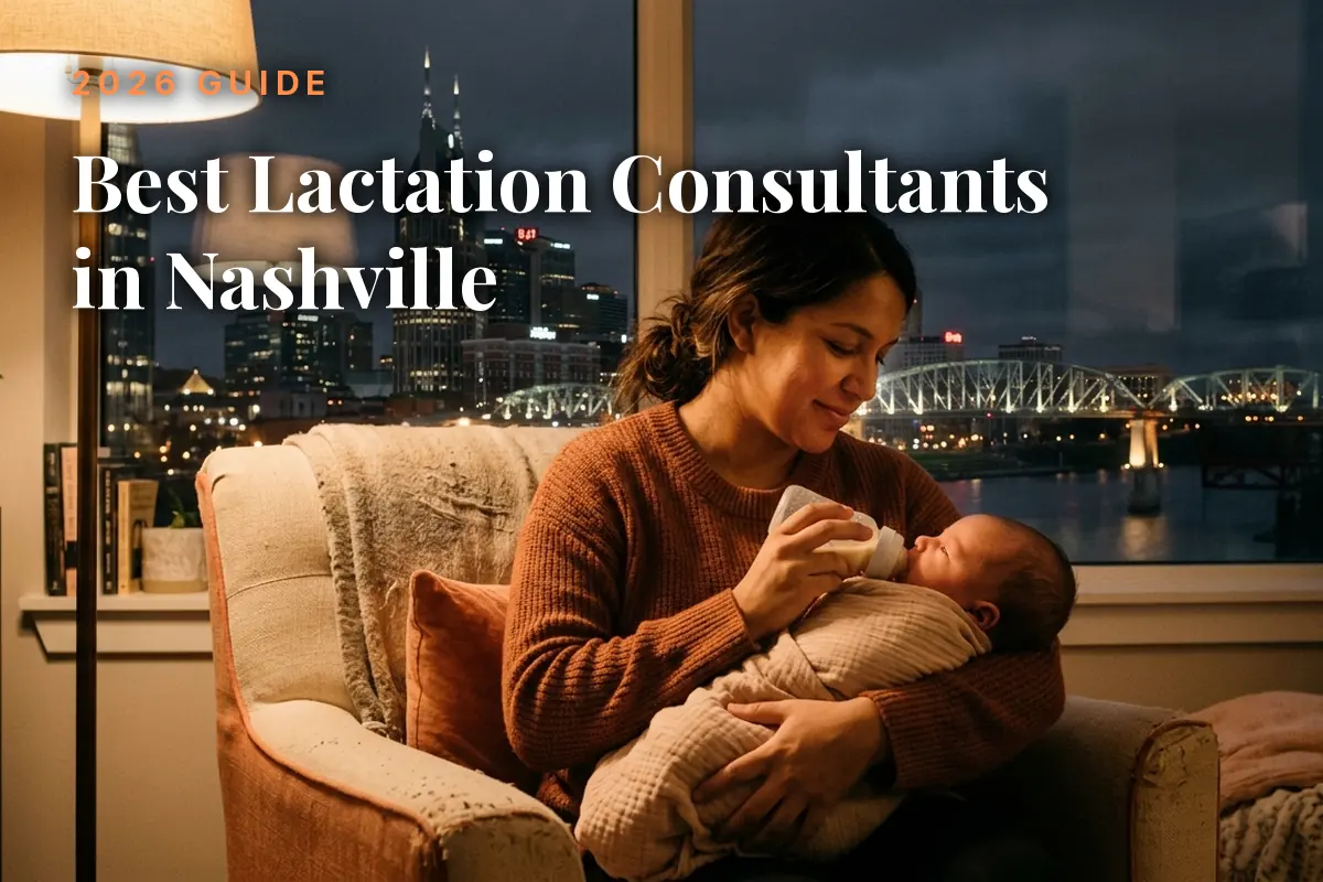 Mother feeding her baby by an evening window with the Nashville skyline, cover image for the best lactation consultants in Nashville guide