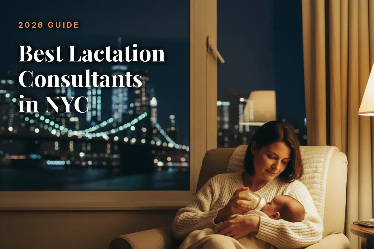 Nighttime city skyline through a window; a mother in a cream chair bottle-feeds her baby, with the title '2026 GUIDE Best Lactation Consultants in NYC'
