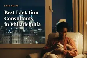 Mother feeding her baby at home in the evening, illustrating a guide to the best lactation consultants in Philadelphia