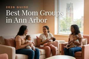Best mom groups in Ann Arbor, MI: three moms holding their babies at a Ann Arbor new-parent meetup