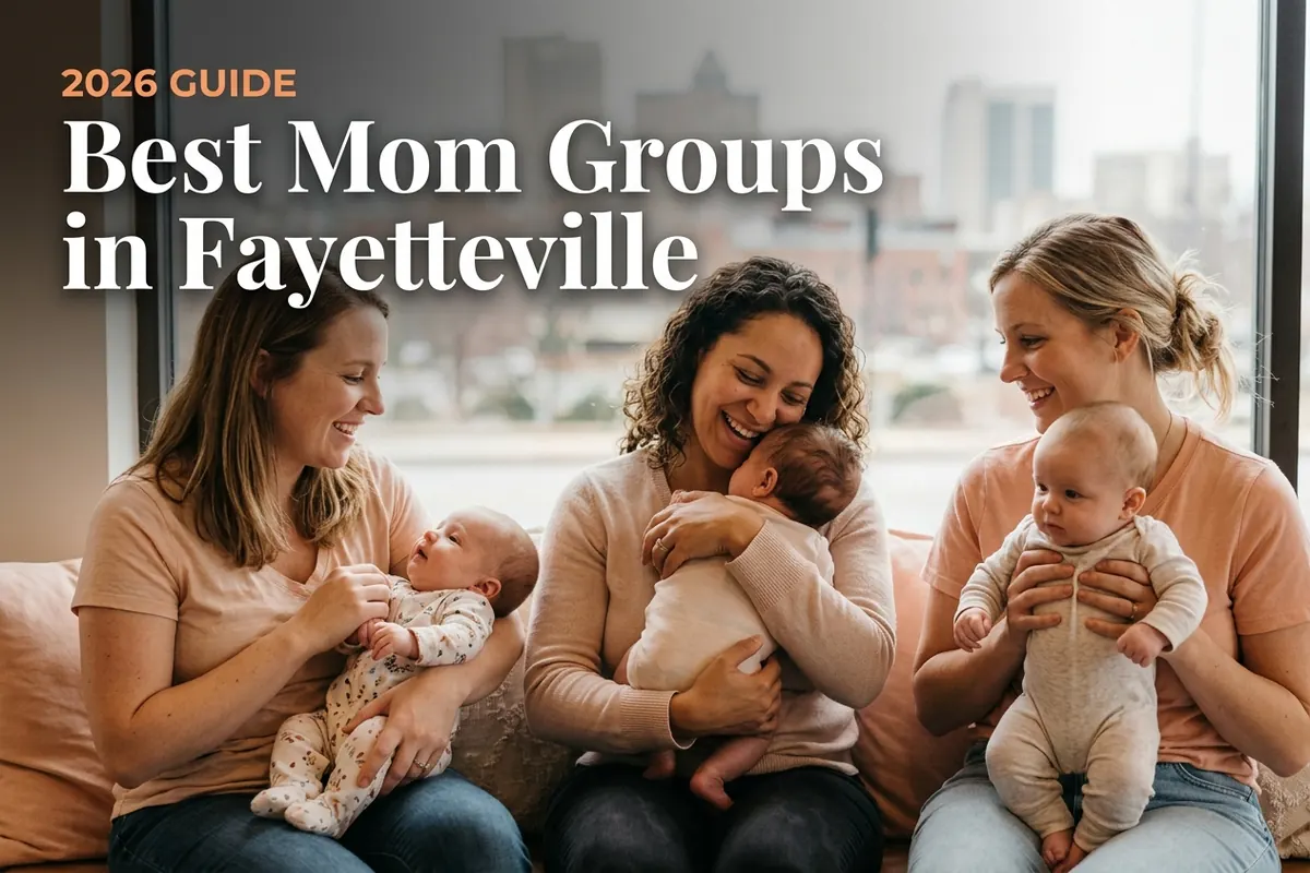 Hero image: four smiling moms each with a baby on a pink couch, city skyline in the background (Fayetteville mom groups guide).