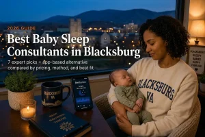 Mother holding a sleeping baby beside a window overlooking the Blue Ridge ridgeline, guide to baby sleep consultants in Blacksburg Virginia