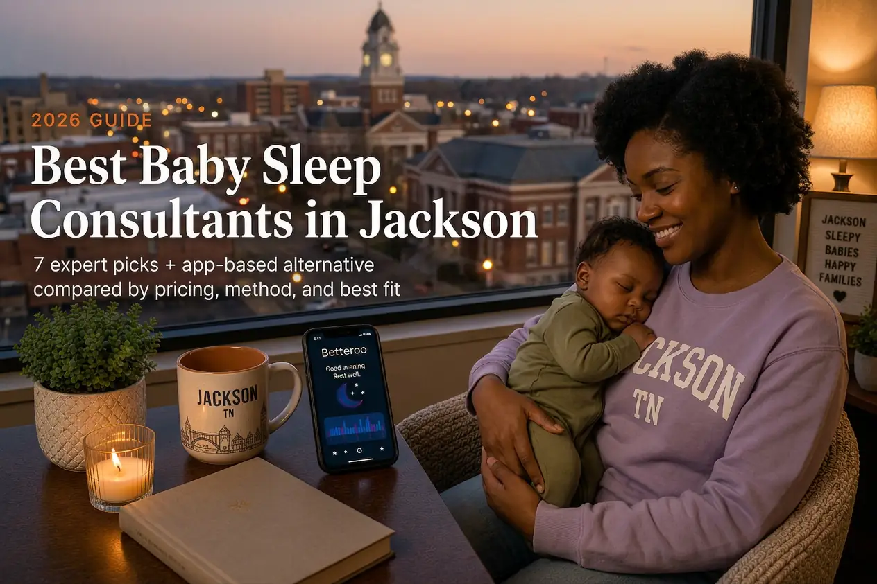 Mother holding a sleeping baby by a window above the downtown courthouse tower, baby sleep consultants in Jackson Tennessee