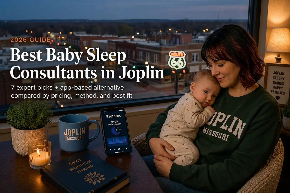 Mother and baby by a window over downtown Joplin at dusk, baby sleep consultants in Joplin guide