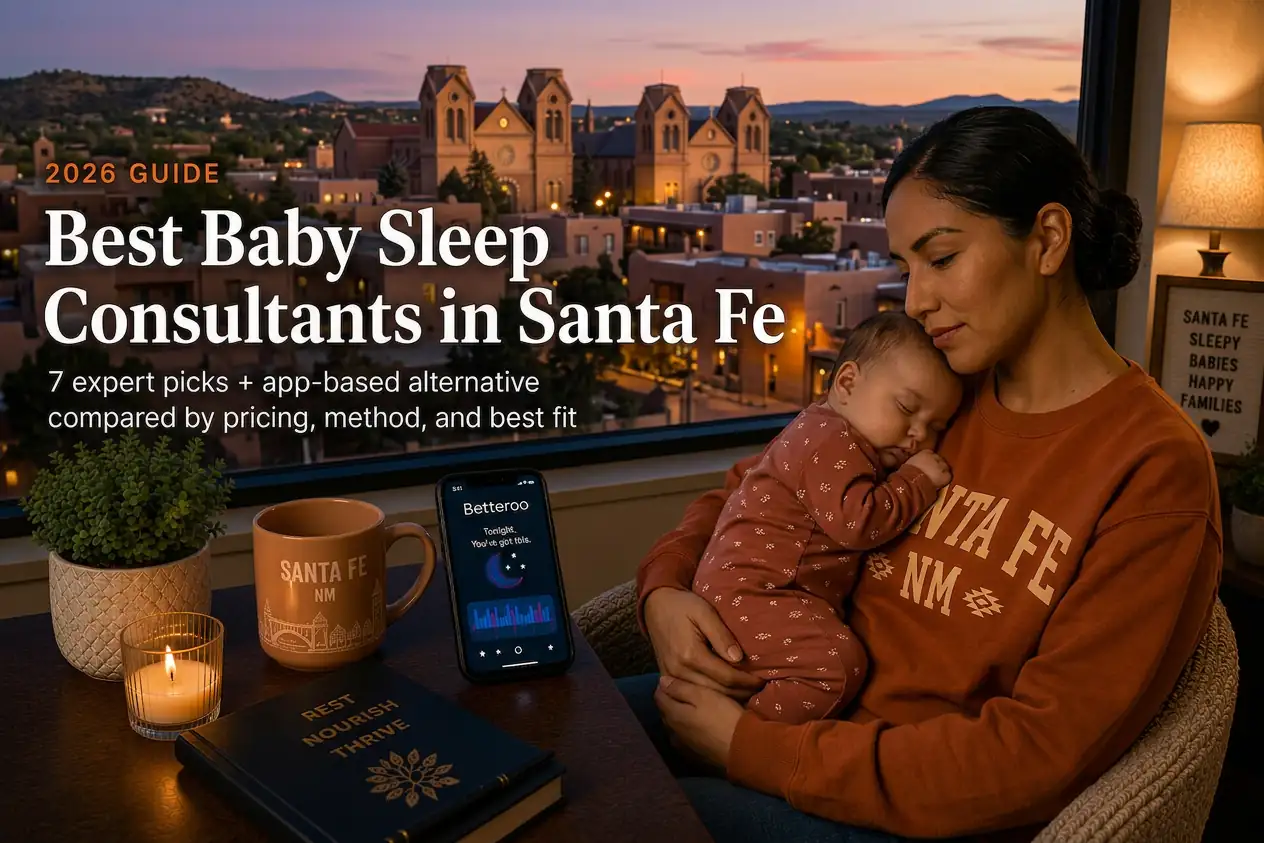 Top 6 Best Baby Sleep Consultants in Santa Fe Nm 2026 | Betteroo Mother holding a sleeping baby by a window overlooking the Santa Fe adobe skyline at dusk, guide to baby sleep consultants in Santa Fe