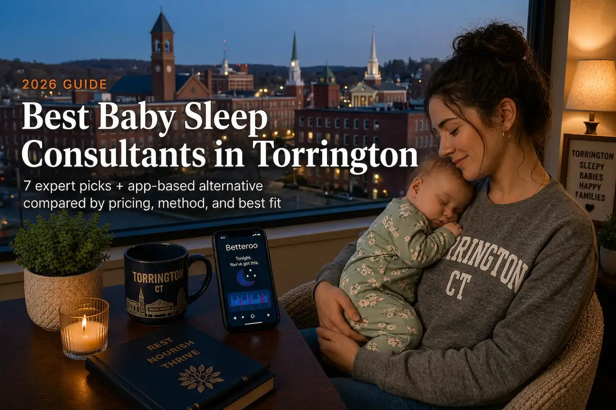 Mother cradling a sleeping baby at dusk above Litchfield hills, a guide to baby sleep consultants in Torrington