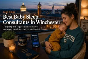 Mother cradling a sleeping baby at dusk above downtown Winchester, a guide to baby sleep consultants in Winchester