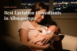 Mother feeding her baby at home in the evening in Albuquerque, illustrating a guide to the best lactation consultants in Albuquerque