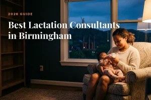 Best lactation consultants in Birmingham: mother feeding her baby at home in the evening
