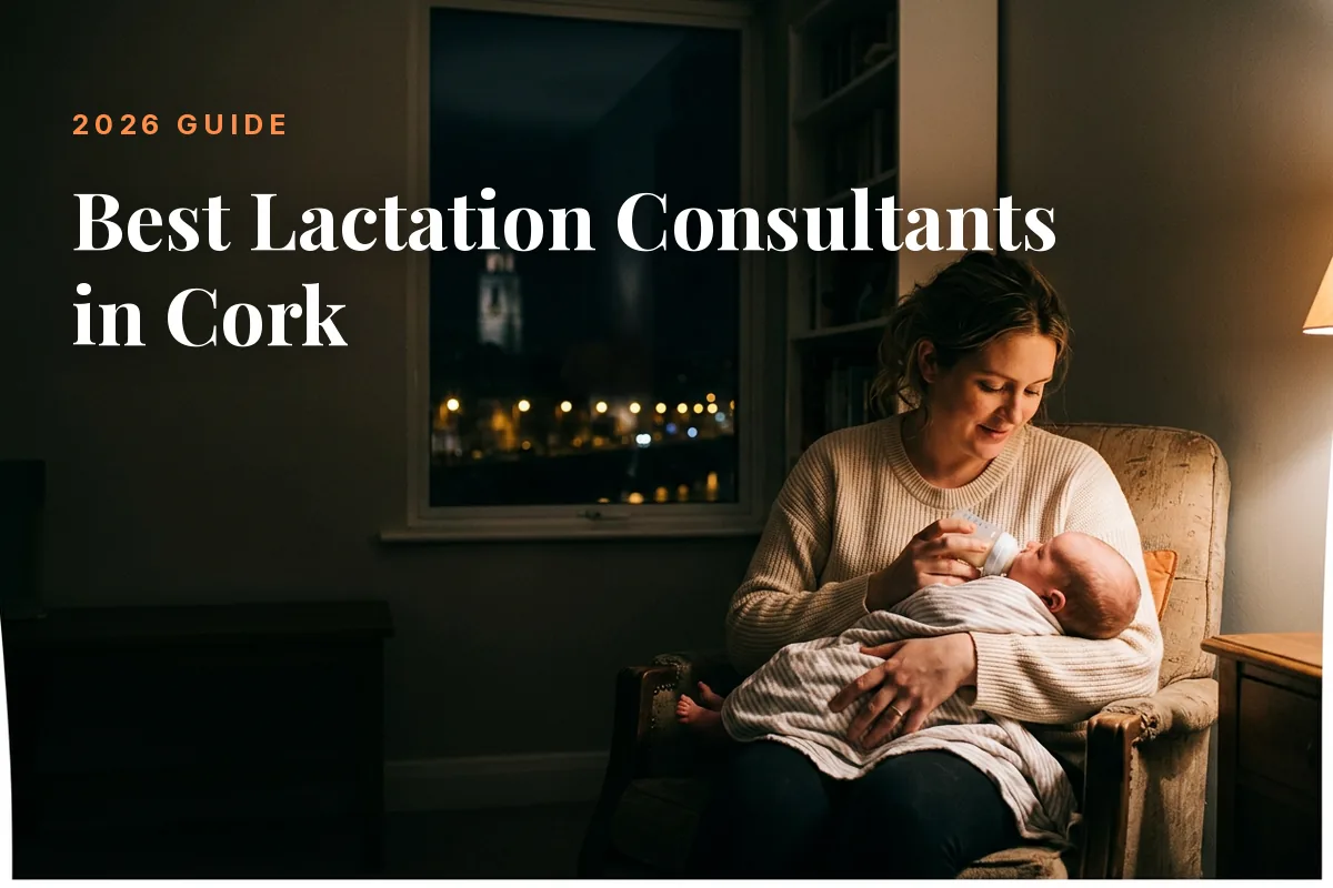 Mother feeding her baby at home in the evening in Cork, illustrating a guide to the best lactation consultants in Cork