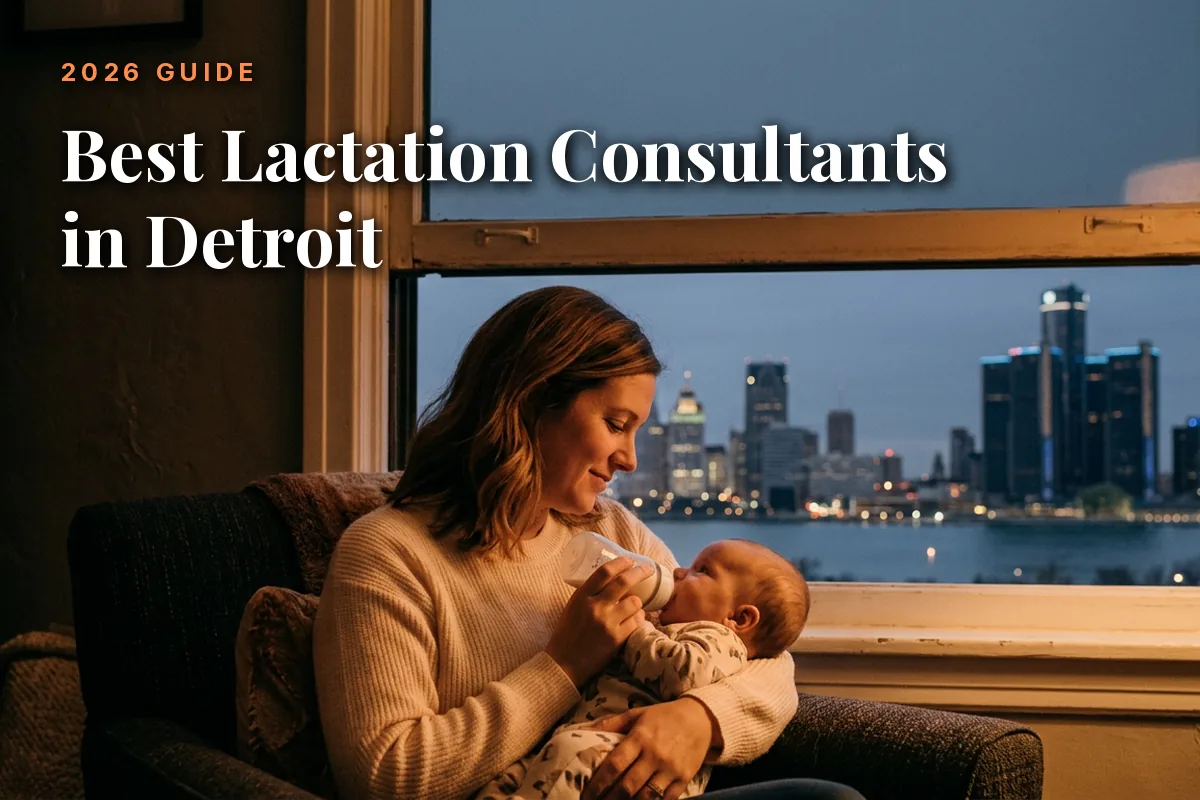 Best lactation consultants in Detroit guide cover: mother bottle feeding her baby in a warm evening living room with the Detroit skyline through the window
