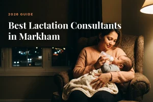 Mother feeding her baby at home in Markham at night, cover image for the Betteroo guide to the best lactation consultants in Markham in 2026