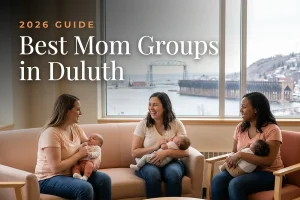 Best mom groups in Duluth, MN: three moms holding their babies at a Duluth new-parent meetup