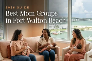 Best mom groups in Fort Walton Beach, FL: three moms holding their babies at a Fort Walton Beach new-parent meetup
