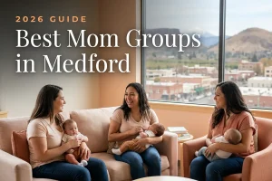Best mom groups in Medford, OR: three moms holding their babies at a Medford new-parent meetup