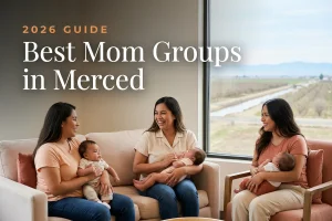 Best mom groups in Merced, CA: three moms holding their babies at a Merced new-parent meetup