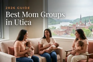 Best mom groups in Utica, NY: three moms holding their babies at a Utica new-parent meetup