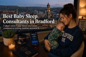 Mother rocking sleeping baby by window overlooking Bradford City Hall at dusk, baby sleep consultants in Bradford