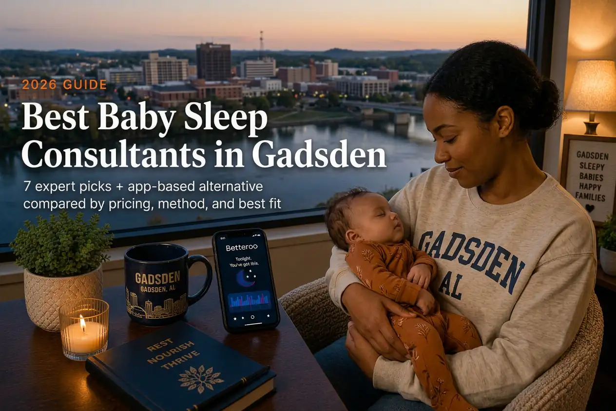 Mother holding sleeping baby by a window over the Coosa River at dusk, baby sleep consultants in Gadsden