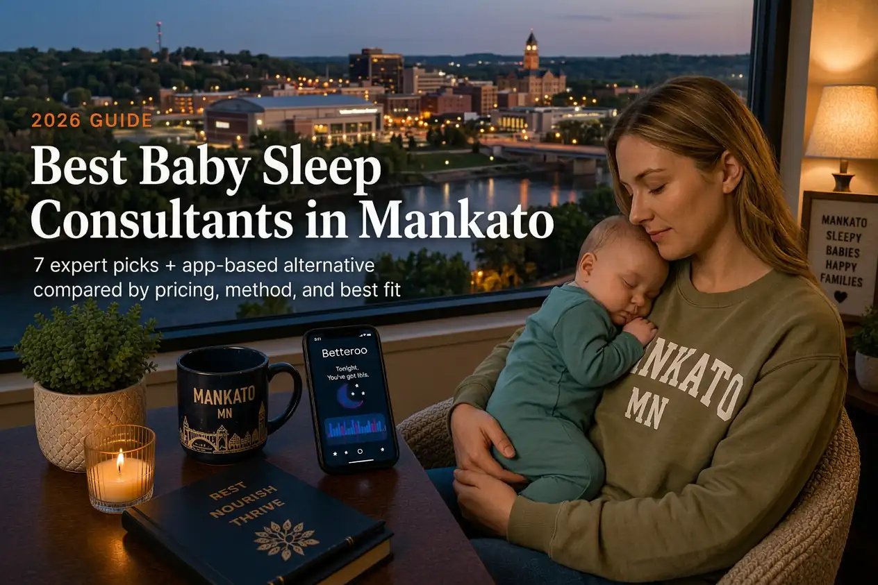 Mother holding sleeping baby by a window over the Minnesota River at dusk, baby sleep consultants in Mankato