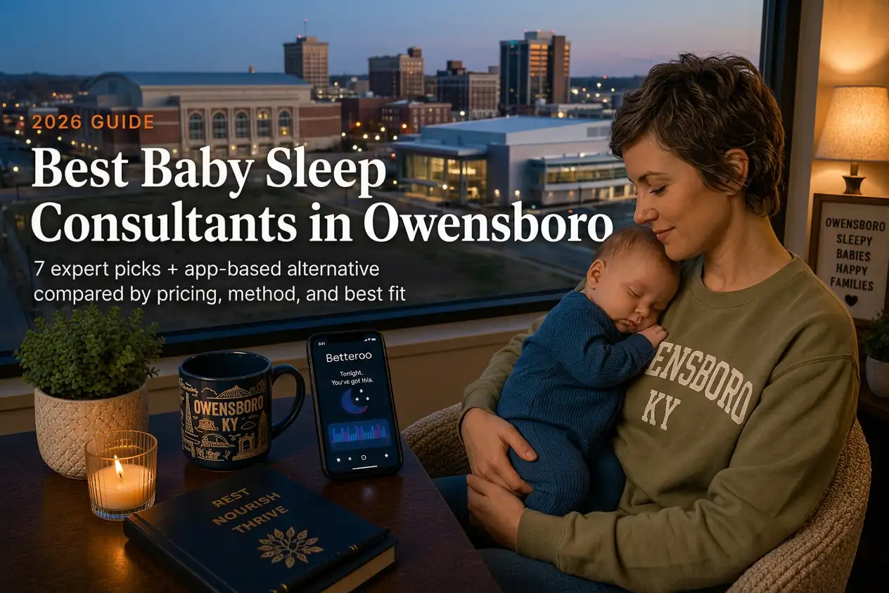 Mother holding a sleeping baby by a window overlooking downtown Owensboro at dusk, baby sleep consultants in Owensboro