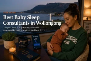 Top 7 Best Baby Sleep Consultants in Wollongong Australia 2026 | Betteroo Mother rocking a sleeping baby above the lighthouse and Illawarra escarpment, baby sleep consultants in Wollongong