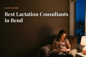 Mother feeding her baby at home in Bend at night, cover image for the Betteroo guide to the best lactation consultants in Bend in 2026