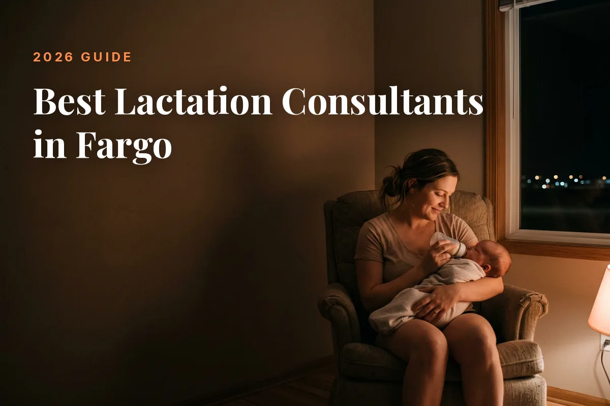 Mother feeding her baby at home in Fargo at night, cover image for the Betteroo guide to the best lactation consultants in Fargo in 2026