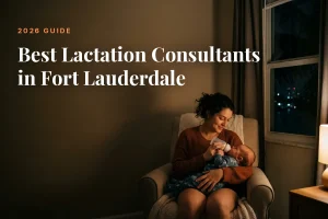 Mother feeding her baby at home in Fort Lauderdale at night, cover image for the Betteroo guide to the best lactation consultants in Fort Lauderdale in 2026